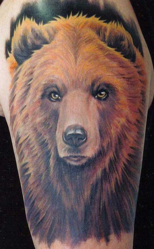 Big colored bear on arm