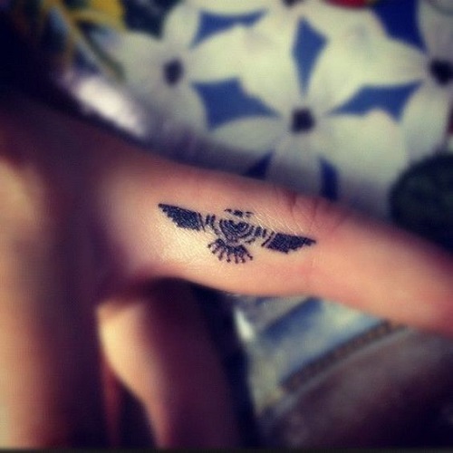Small bird navy style on finger - (Tattoo Pictures)(Tattoo Pictures)