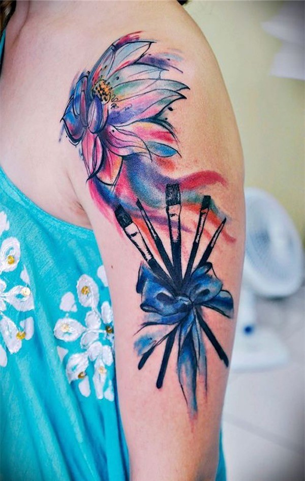 Flower and make up brushes tattoo