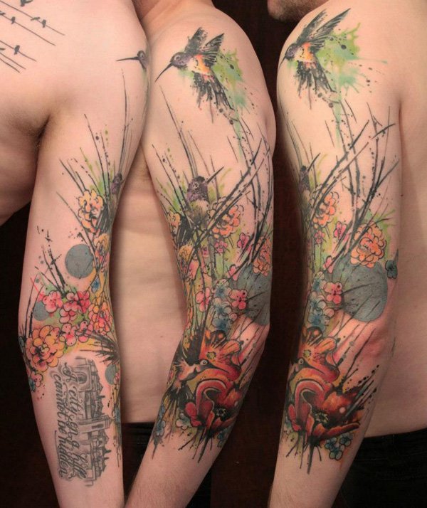 Hummingbird and flower watercolor tattoo