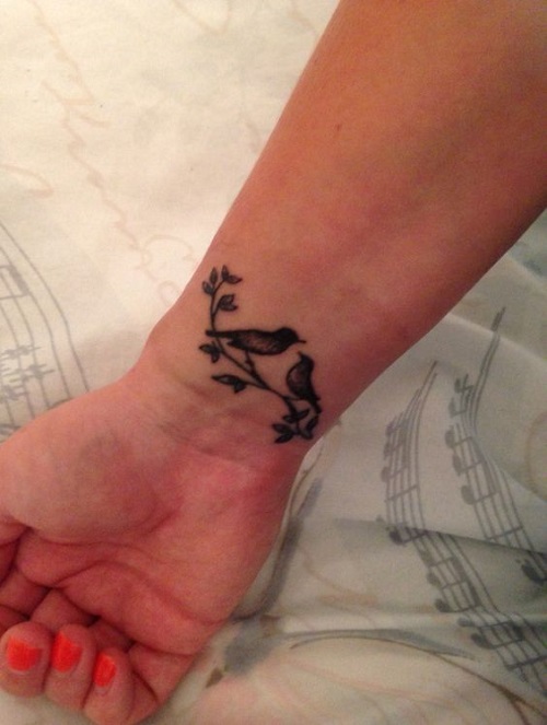 Lovebirds tattoos on wrist