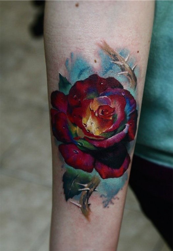 Multi colored rose on arm