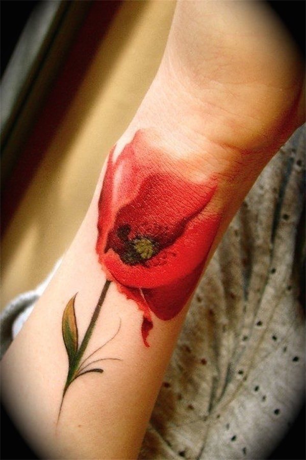 Pretty red flower wrist tattoo