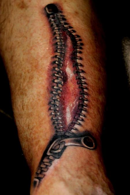 Realistic Zipper And Inner Skin Tattoo