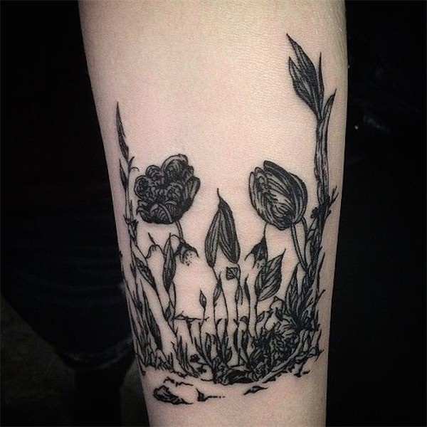 Skull from flowers tattoo