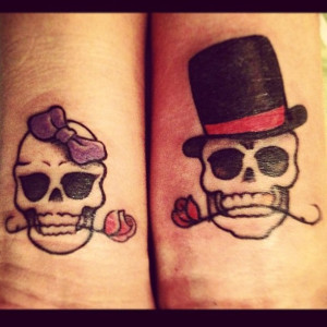 Skulls matching love tattoo