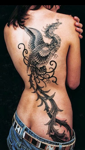 Very long artistic one color bird on womens back