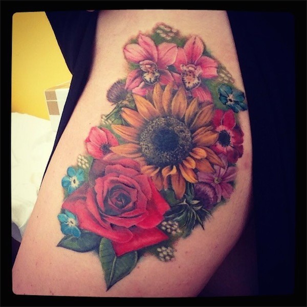 Asorted flowers on thigh