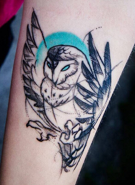 Big owl with blue b ackground on hand