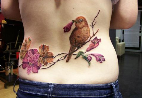 Bird on branch with flowers