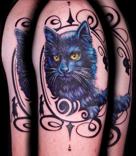 Blue and black cat with ornament