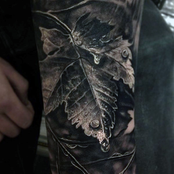 Brilliant grey colored leaf and dew drop realism tattoo mens sleeve