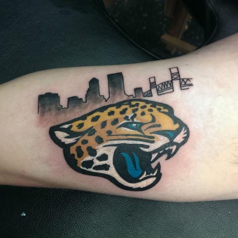 Cheetah and city ond arm