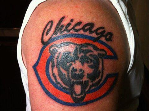 Chicago bear on arm