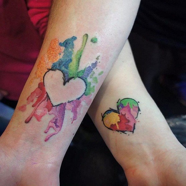 Color heart puzzle tattoo