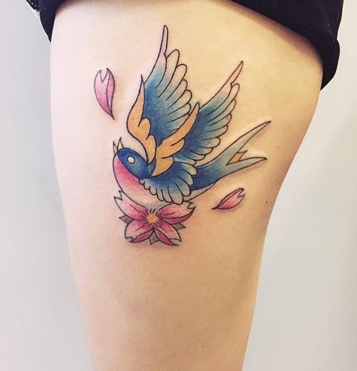 Colored big swallow with flowers on leg