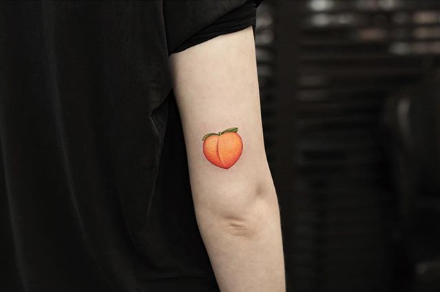 Colored peach on the arm