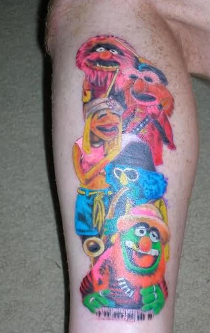 Colorful mupets show cartoons on leg