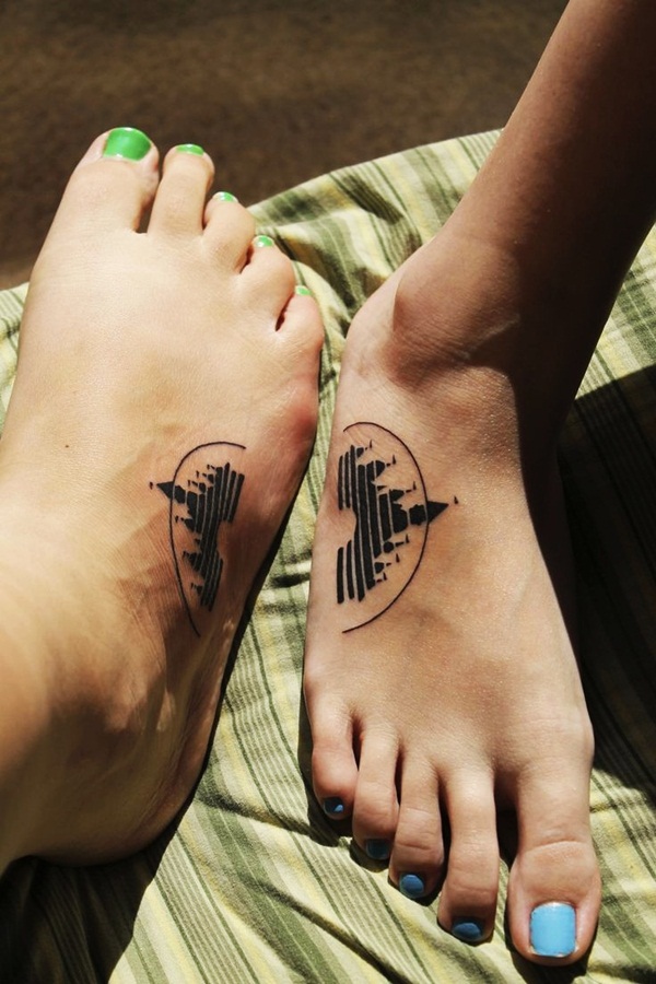 Disney logo matching tatoo on foot
