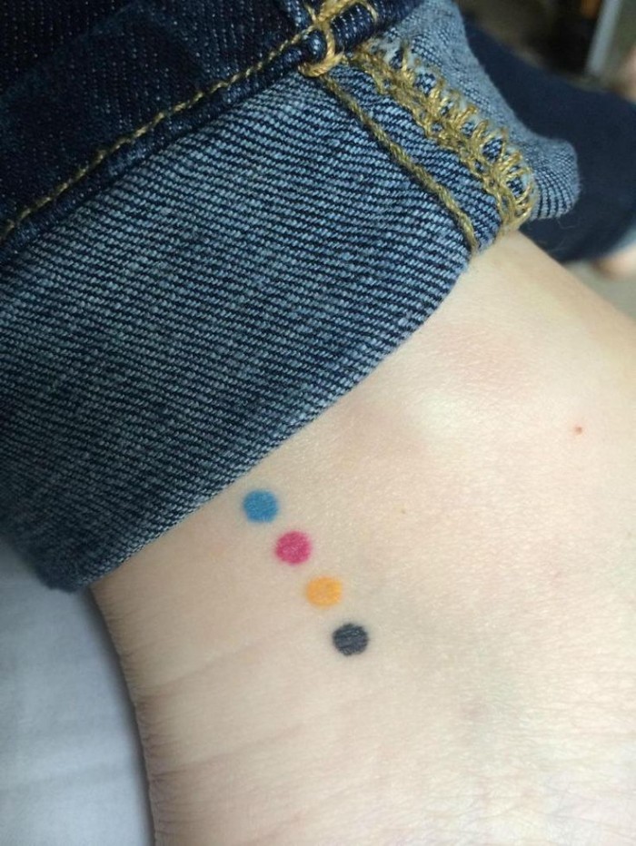 Four colored dots