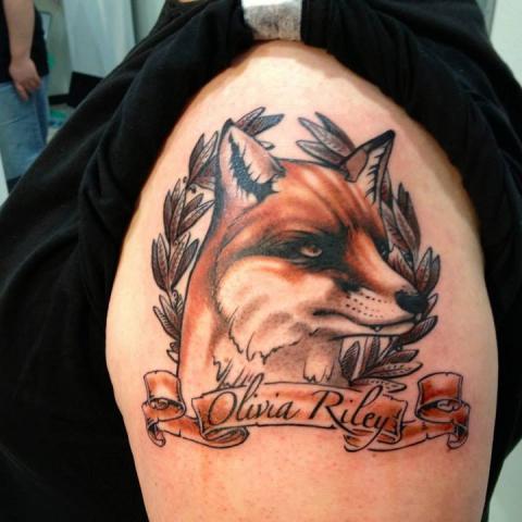 Fox head and quote on shoulder