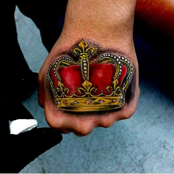 Full colored realistic crown on hand