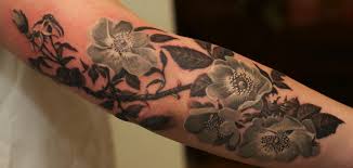 Gray roses on arm