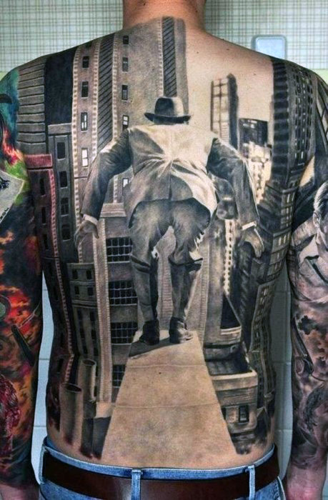 Guys full back realistic tattoo of man jumping from skyscraper