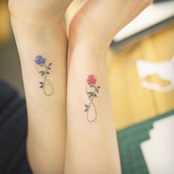 Infinity minimal flower tattoo