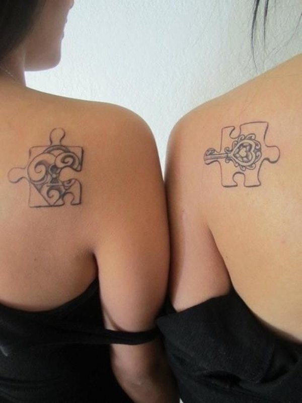 Interlocking puzzle pieces matching tattoos
