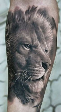 Lions head in gray on arm