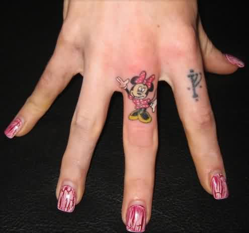 Little minnie tattoo on finger