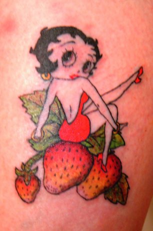 Lovely betty boop sitting on strawberries