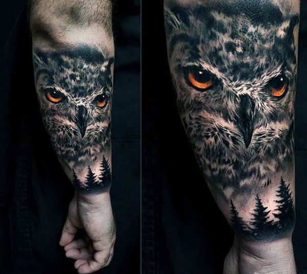 Male forearms realistic sombre eyed owl tattoo