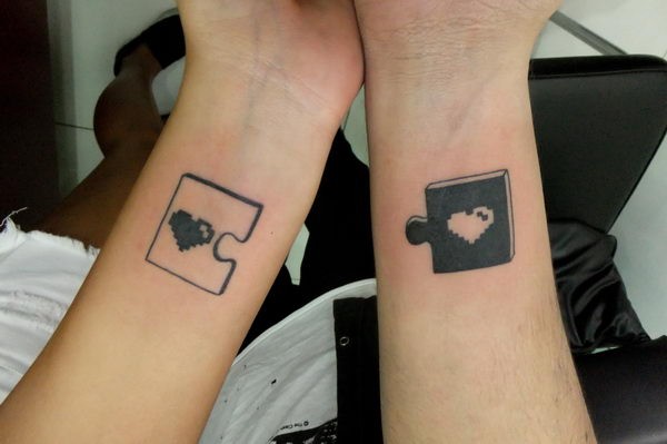 Puzzle matched for couple on arms