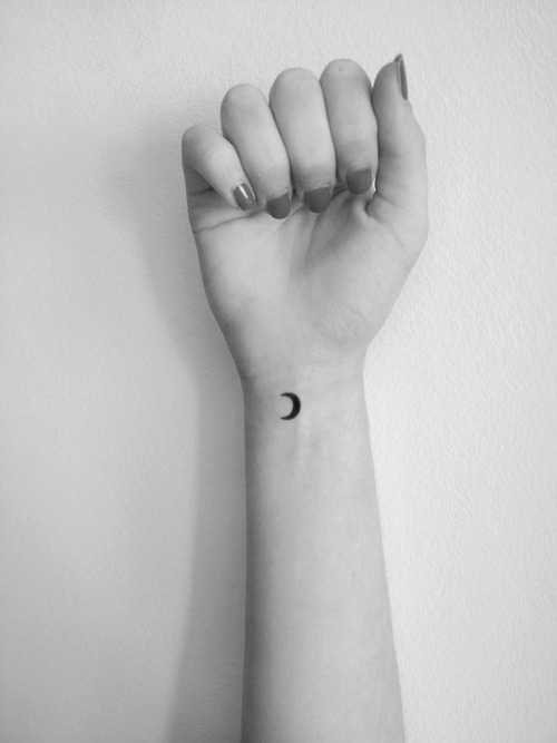 Quarter moon minimal tattoo