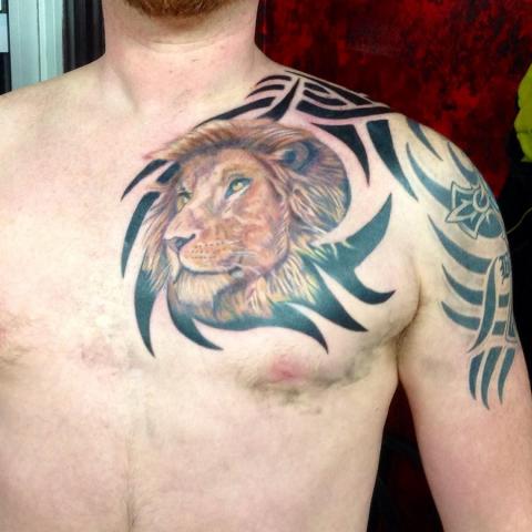 Realistic small lion head in color on chests