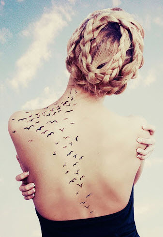 So much black birds on womens back