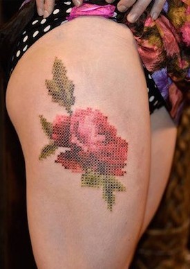 Tapestry flower on thigh