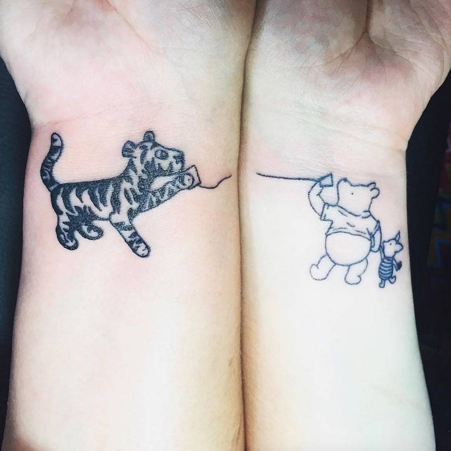 Tiger and viny puh matching tattoo