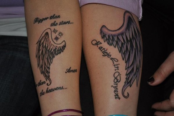 Two angel wiangs matching tattoos