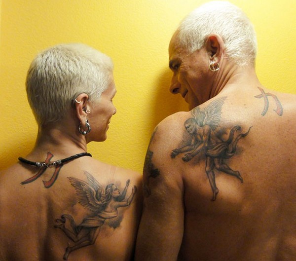 Two big angels matching tattoo