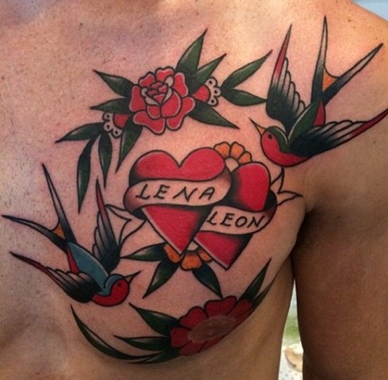 Two big colored swallows and hearts for lovers on chest