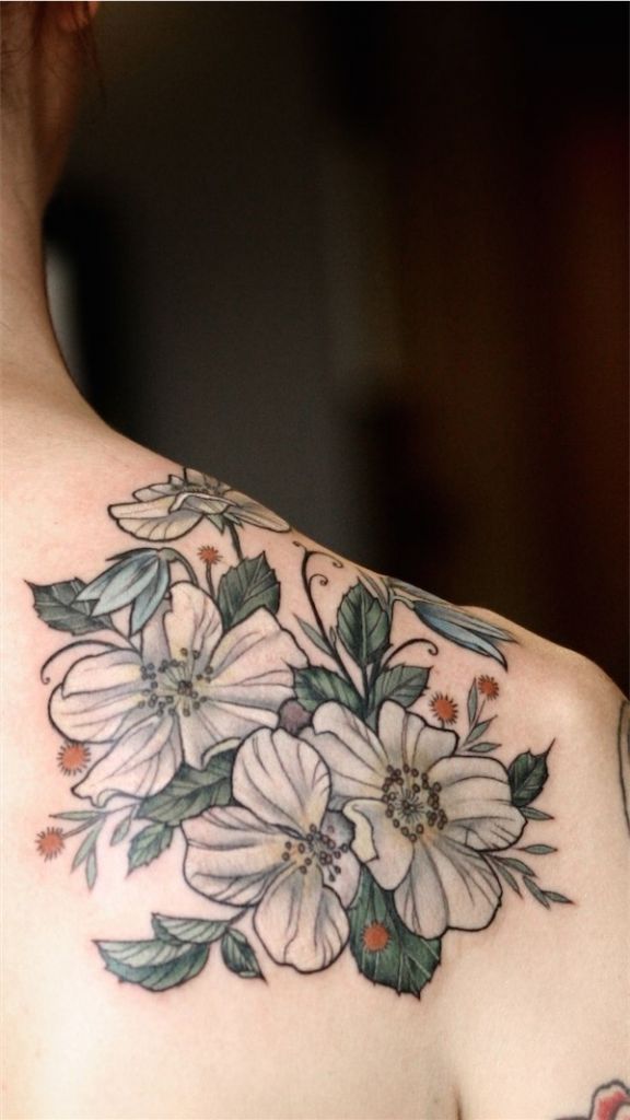 White flowers on shoulder