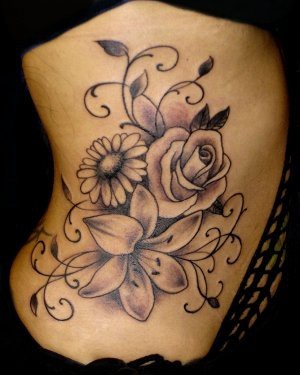 Wonderful flower gray tattoo on side