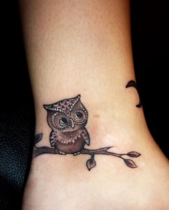 Wrist tattoo owl